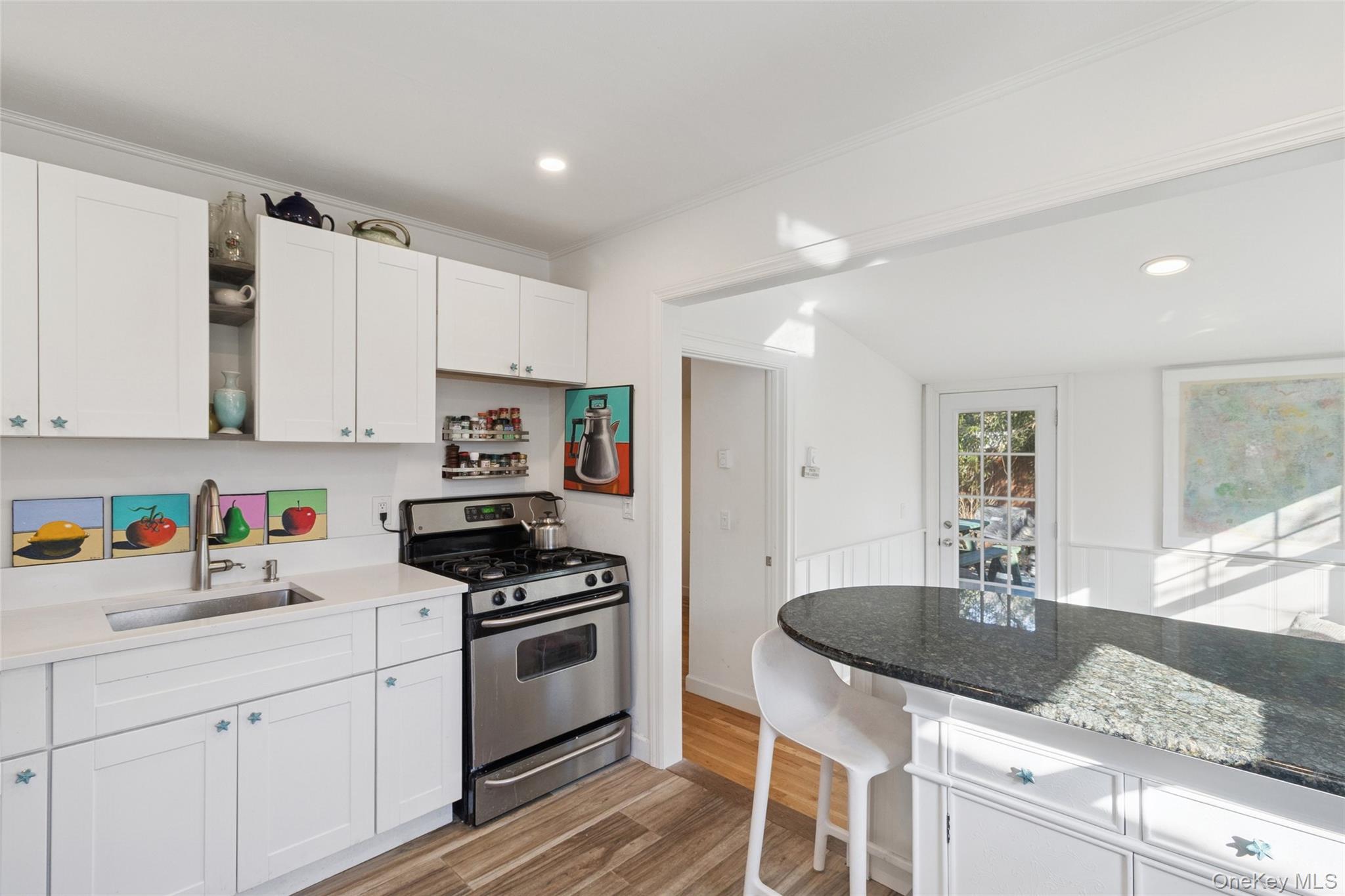 165 Springville Road, Unit A Hampton Bays, NY 11946 - Photo 10 of 22 Kitchen featuring white cabinets, gas stove, open shelves, dark stone counters, and recessed lighting