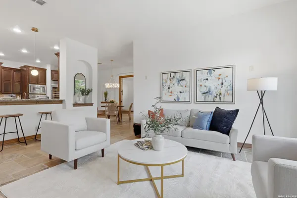 a spacious bedroom with a bed and a large window