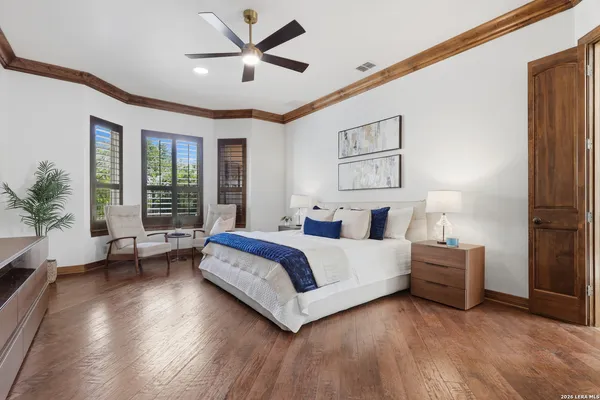 a bedroom with bed and window