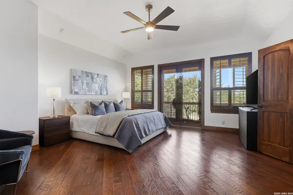 a view of a balcony with wooden floor