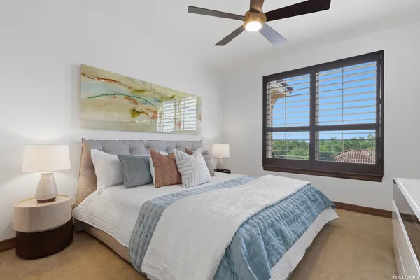 a bathroom with a shower and toilet