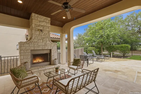 a view of a house with pool porch and chairs