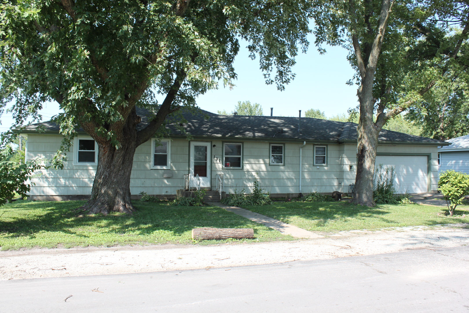 191 East 2740s Road Kankakee, IL 60901 - Photo 1 of 10 a front view of a house with a yard and trees