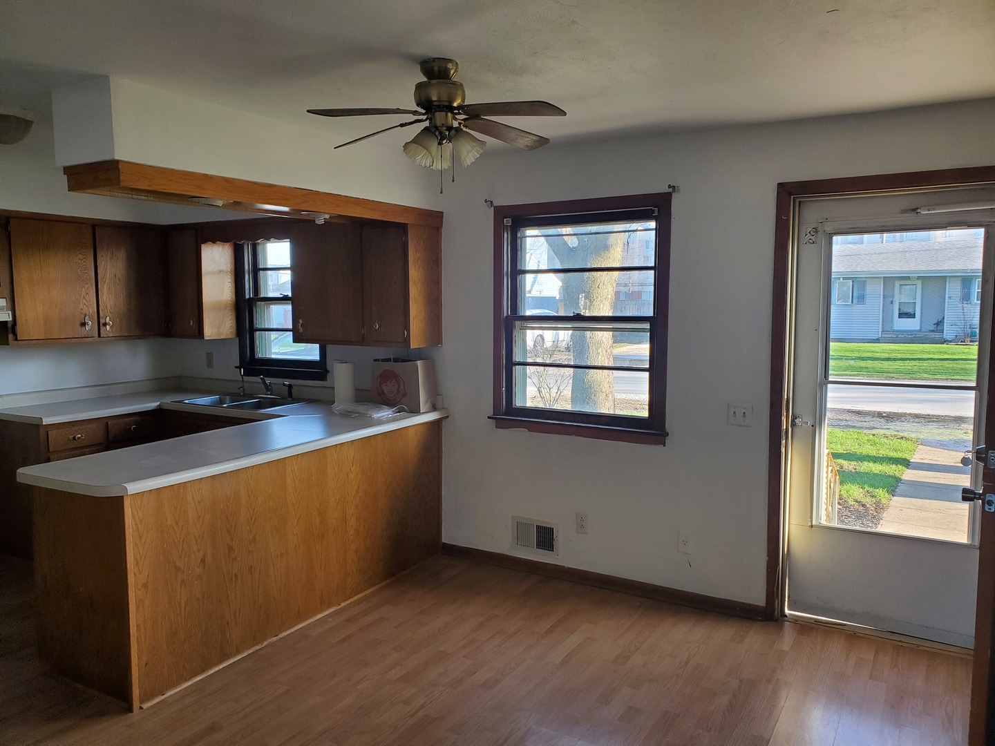 191 East 2740s Road Kankakee, IL 60901 - Photo 2 of 10 a kitchen with stainless steel appliances granite countertop a sink a stove and a refrigerator