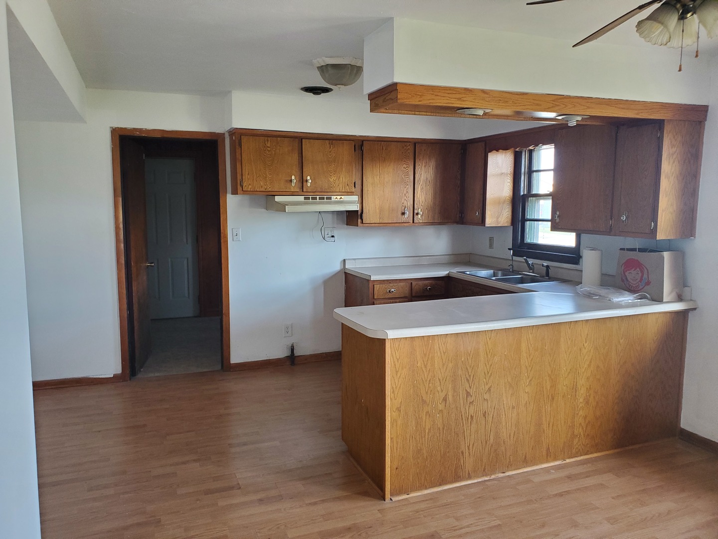 191 East 2740s Road Kankakee, IL 60901 - Photo 3 of 10 a kitchen with stainless steel appliances a sink stove and cabinets