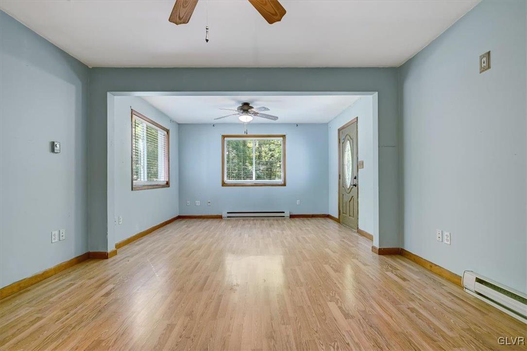 109 Sassafras Road Albrightsville, PA 18210 - Photo 20 of 49 an empty room with wooden floor and windows