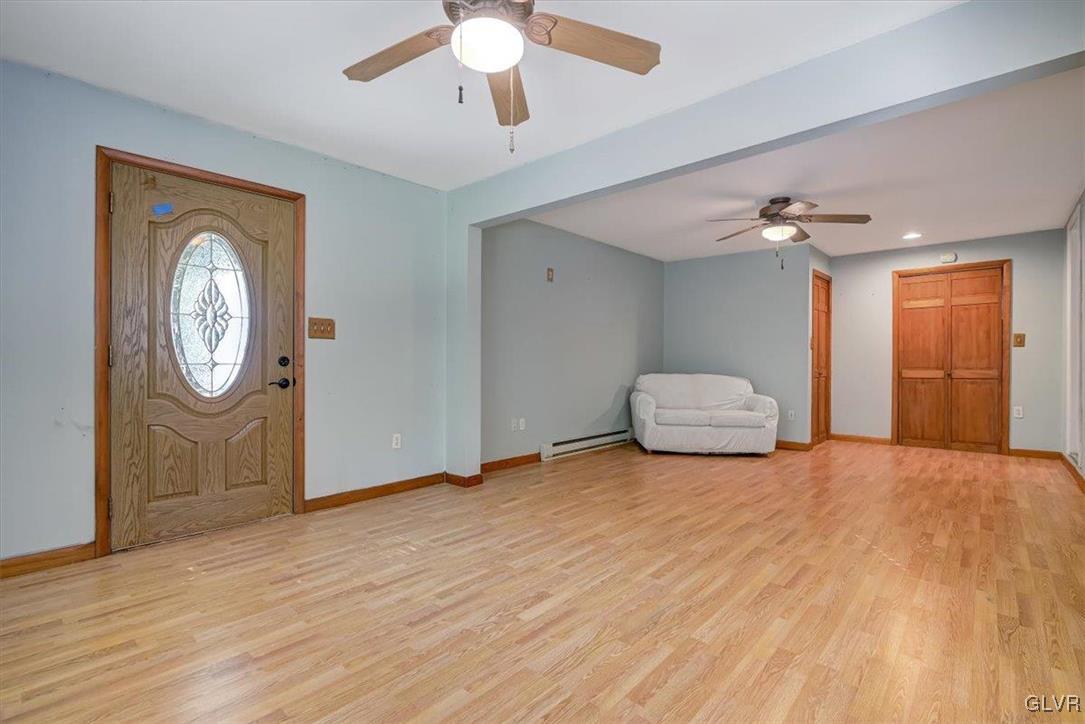 109 Sassafras Road Albrightsville, PA 18210 - Photo 24 of 49 a view of a livingroom with wooden floor and chandelier