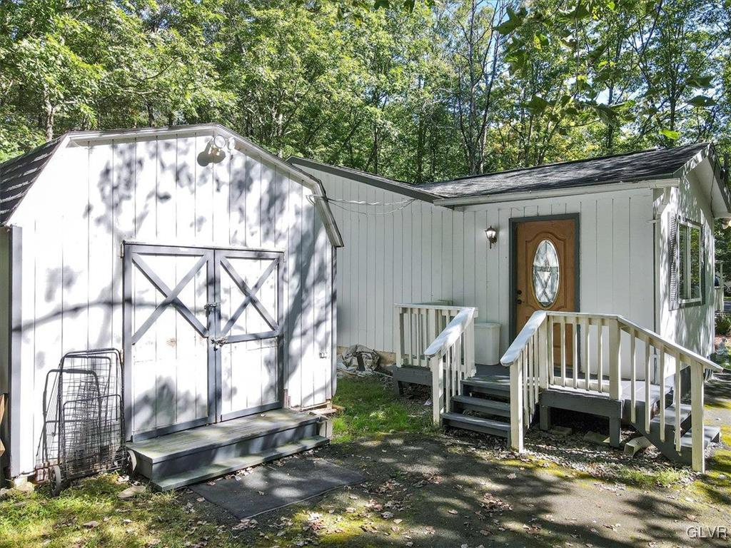109 Sassafras Road Albrightsville, PA 18210 - Photo 35 of 49 a view of wooden house with a yard