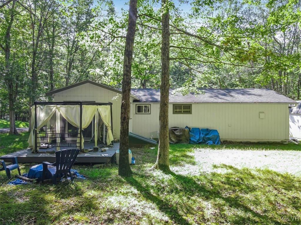 109 Sassafras Road Albrightsville, PA 18210 - Photo 39 of 49 a view of a house with backyard and sitting area