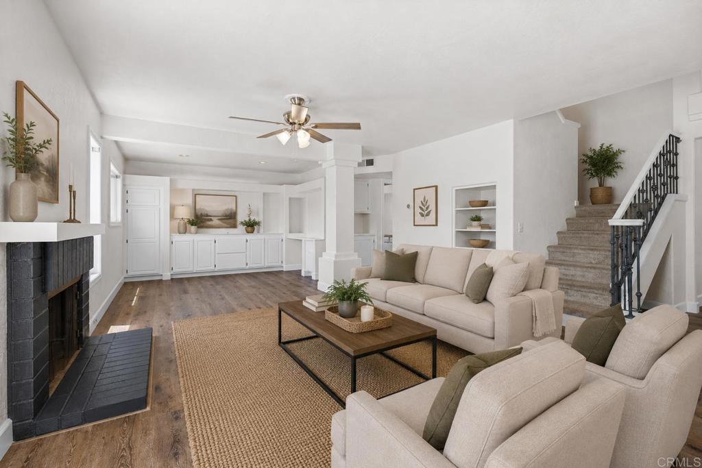 4595 Blackwell Road Oceanside, CA 92056 - Photo 20 of 47 a living room with furniture and a fireplace