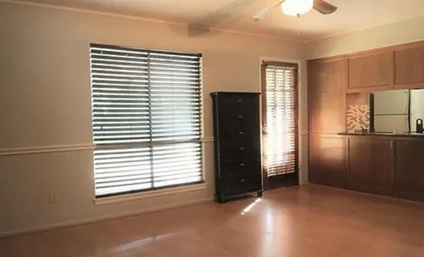 a view of kitchen and windows