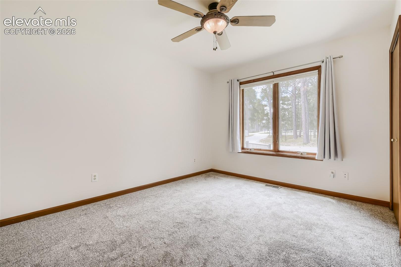 8750 Tannenbaum Road Colorado Springs, CO 80908 - Photo 28 of 50 Secondary bedroom