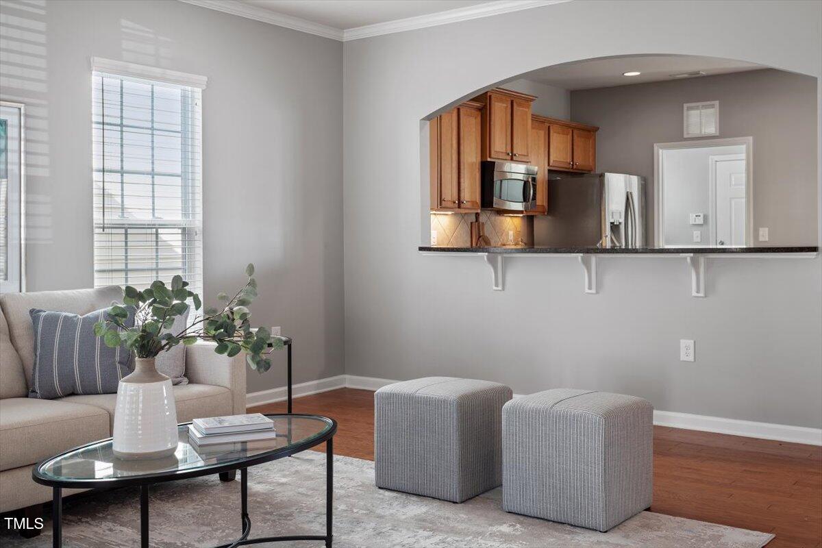 812 Gillinder Place Cary, NC 27519 - Photo 11 of 59 a dining room with furniture and window