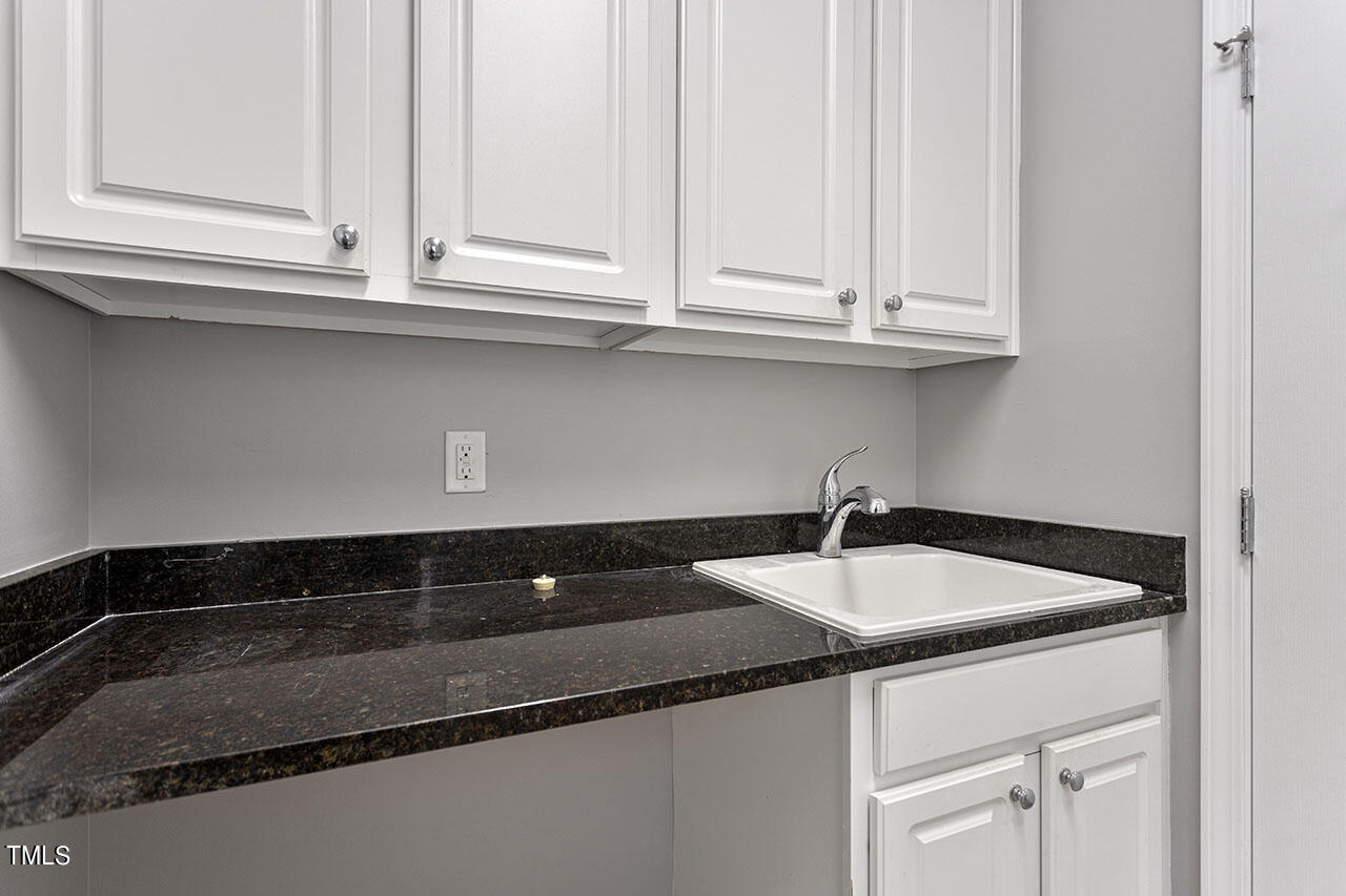 812 Gillinder Place Cary, NC 27519 - Photo 19 of 59 a close view of sink and tap