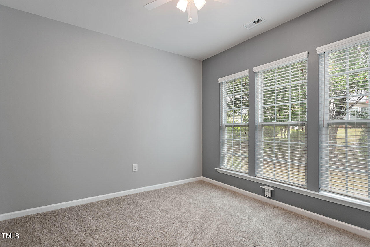 812 Gillinder Place Cary, NC 27519 - Photo 26 of 59 a view of an empty room with a window