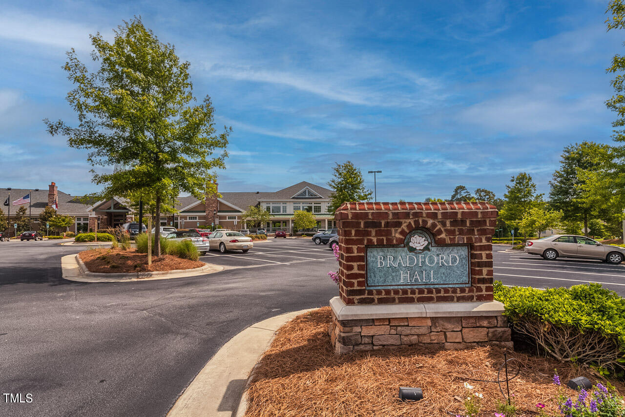 812 Gillinder Place Cary, NC 27519 - Photo 33 of 59 a sign board with buildings in the background