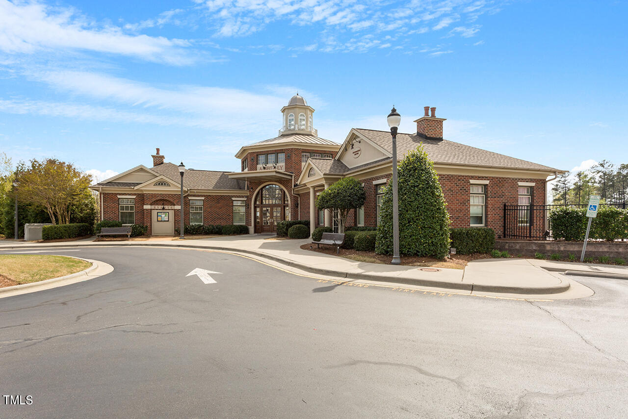812 Gillinder Place Cary, NC 27519 - Photo 39 of 59 a front view of a house with a yard and a garage
