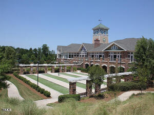 812 Gillinder Place Cary, NC 27519 - Photo 47 of 59 a view of a big house with a big yard and large trees