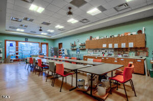 812 Gillinder Place Cary, NC 27519 - Photo 50 of 59 a view of a dining area with furniture and chandelier