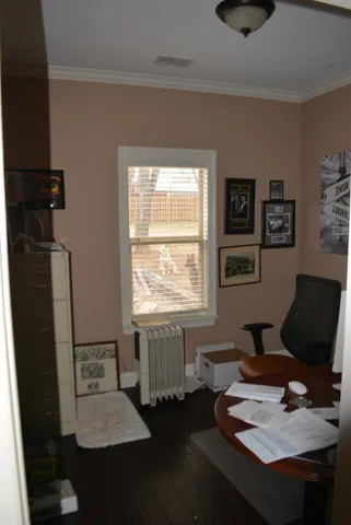 a living room with furniture and window