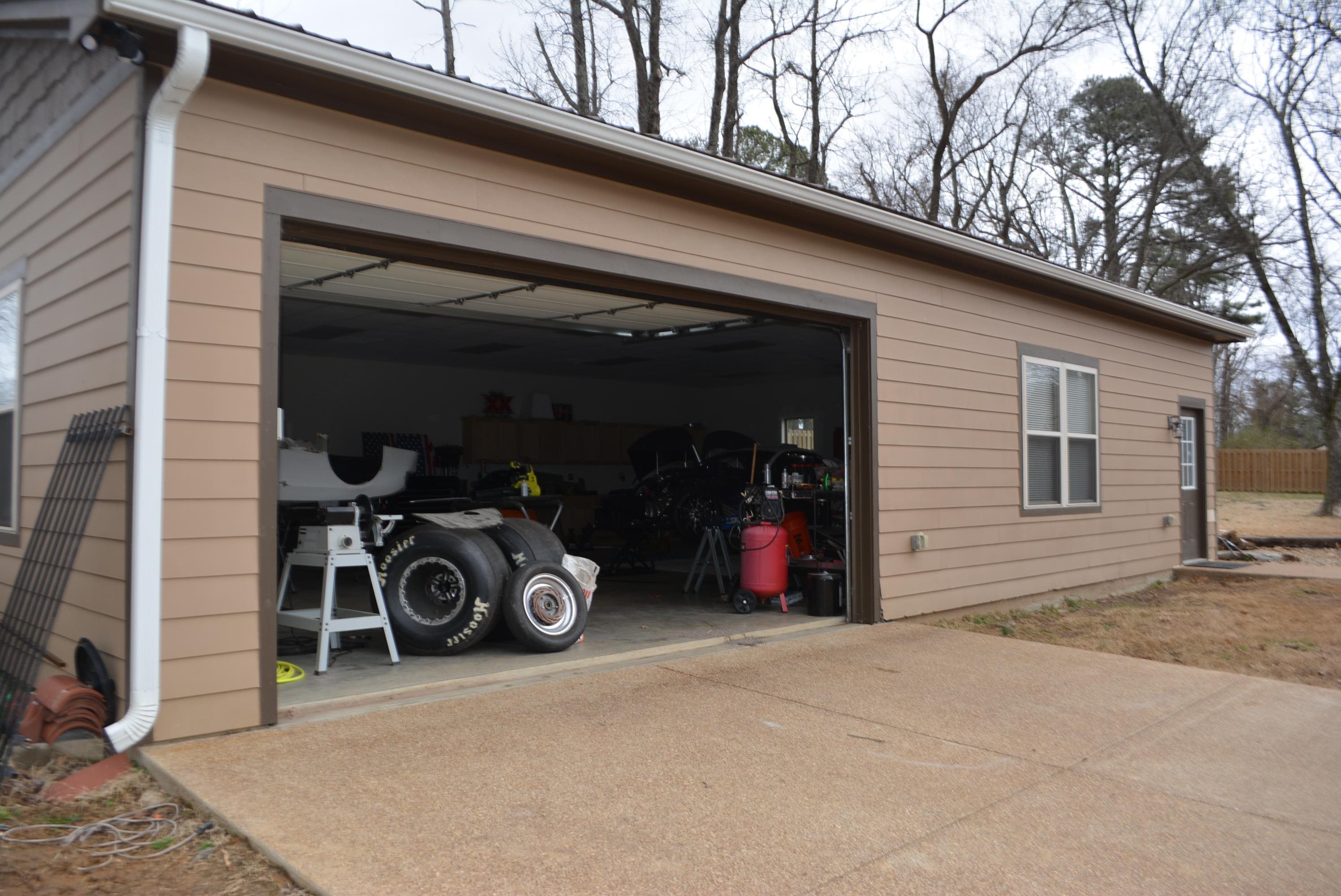 62 Planters Grv Trail Brighton, TN 38011 - Photo 4 of 28 a view of a garage with wooden roof