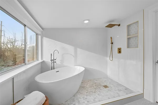 a bathroom with a sink and a bathtub