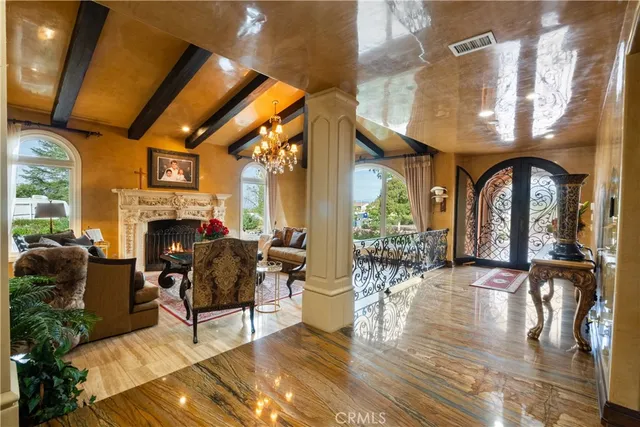 a group of chairs sitting in a kitchen next to a large window