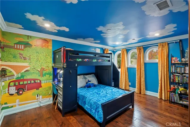 a view of a house with swimming pool and sitting area