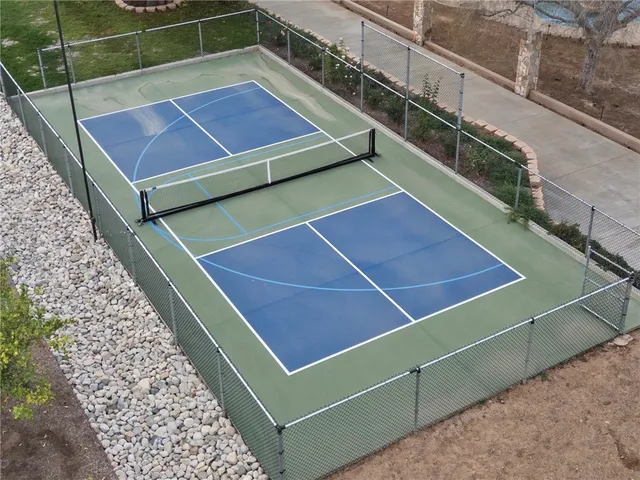 a view of a tree next to a building