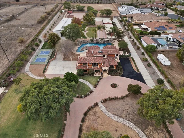 a living room with fireplace furniture and a fireplace