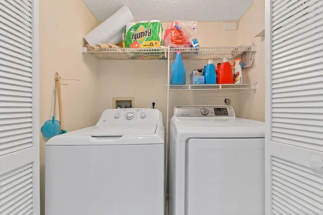 a swimming pool with outdoor seating and yard