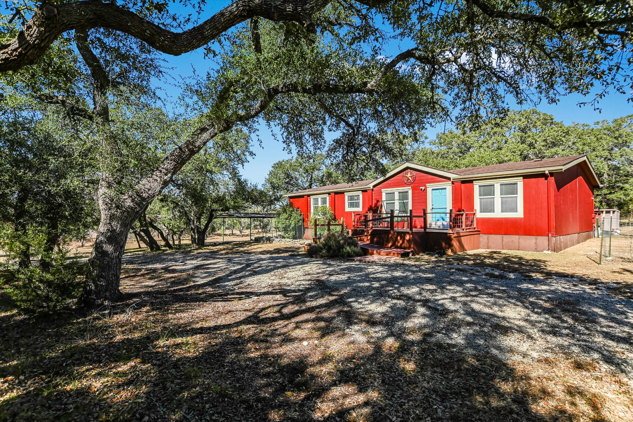 a view of a house with a tree