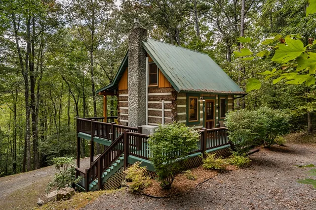 a view of house with outdoor seating area