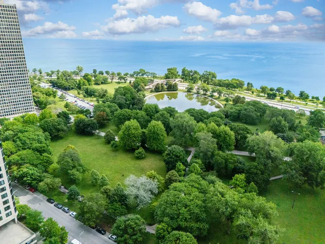 a view of a garden with houses
