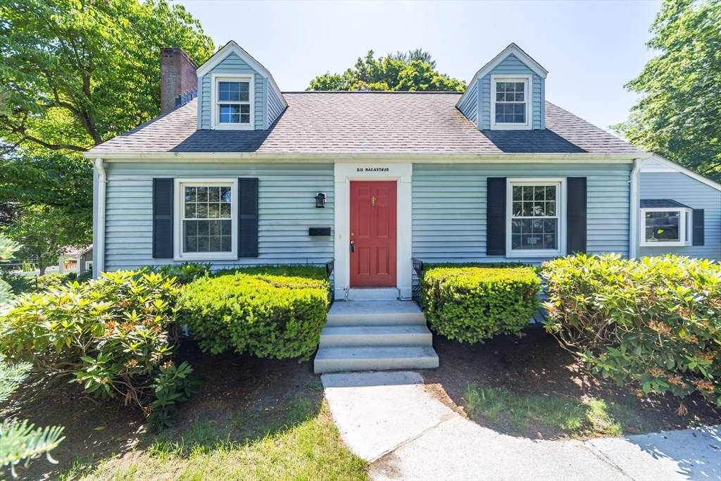 6 MacArthur Road Natick, MA 01760 - Photo 1 of 31 a front view of a house with garden