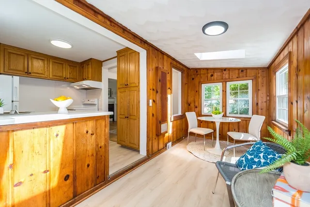 a very nice looking living room with a large window