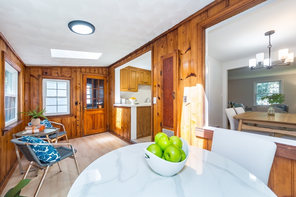 6 MacArthur Road Natick, MA 01760 - Photo 13 of 31 a living room with furniture and potted plants