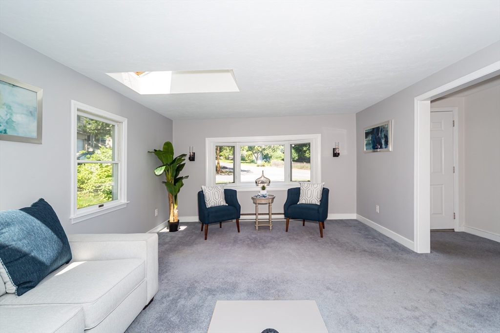 6 MacArthur Road Natick, MA 01760 - Photo 20 of 31 a living room with furniture and a window