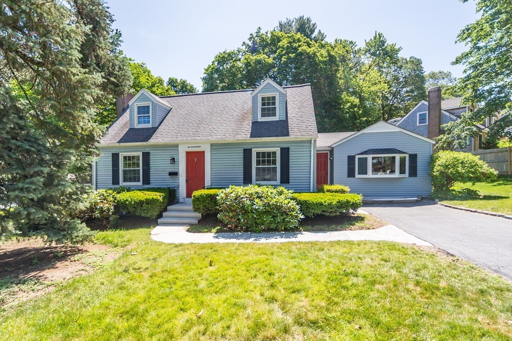 6 MacArthur Road Natick, MA 01760 - Photo 2 of 31 a front view of a house with yard and green space