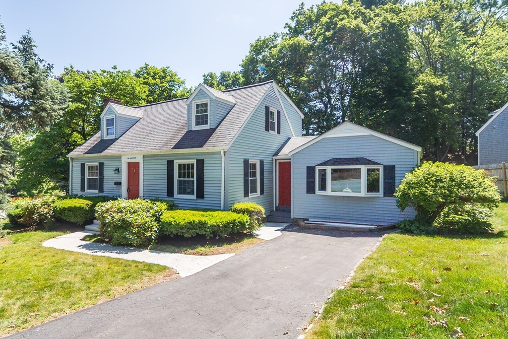 6 MacArthur Road Natick, MA 01760 - Photo 3 of 31 a front view of a house with garden