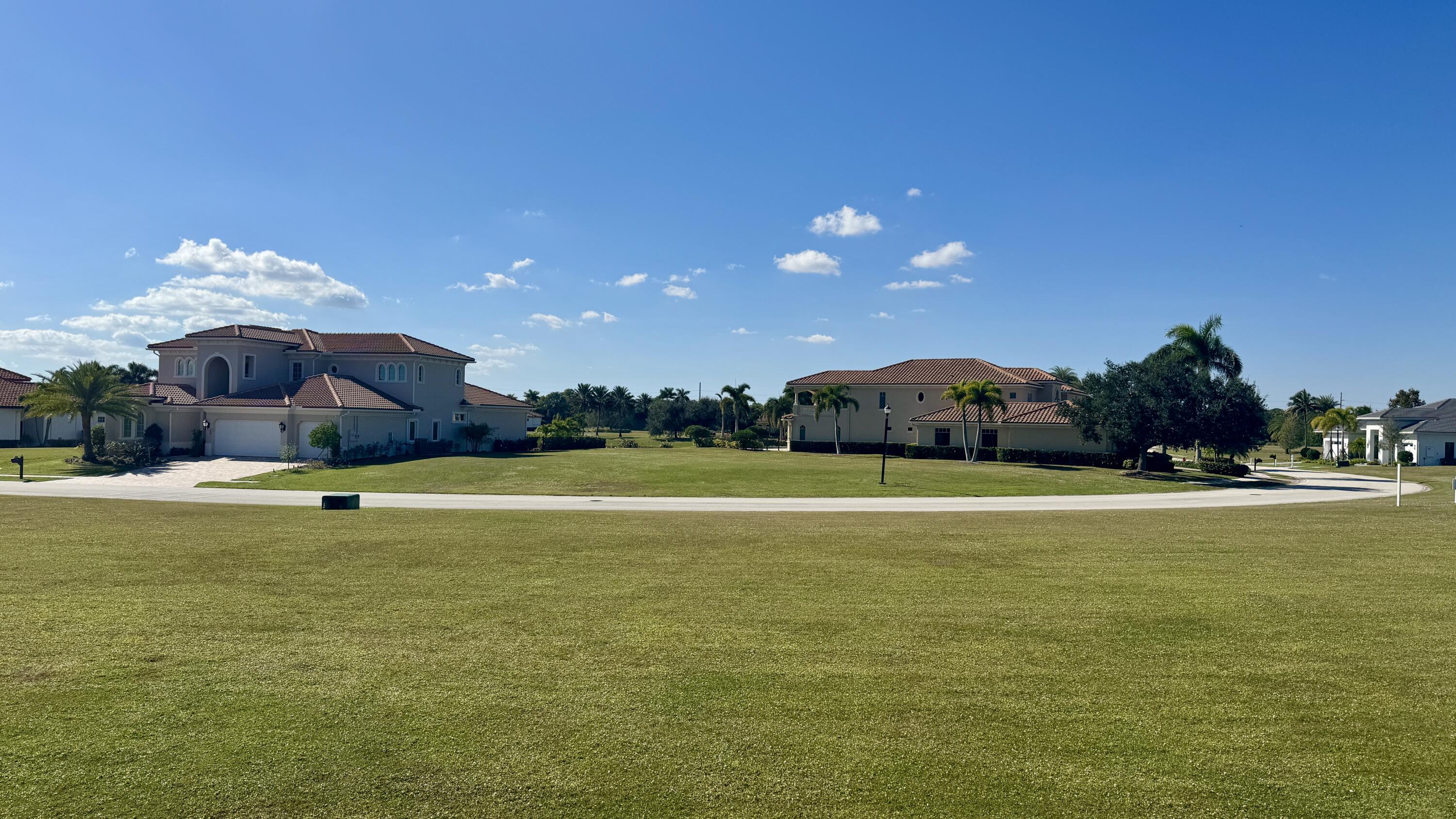 158 Southeast Rio Angelica Port St. Lucie, FL 34984 - Photo 6 of 12 a view of a swimming pool and a yard