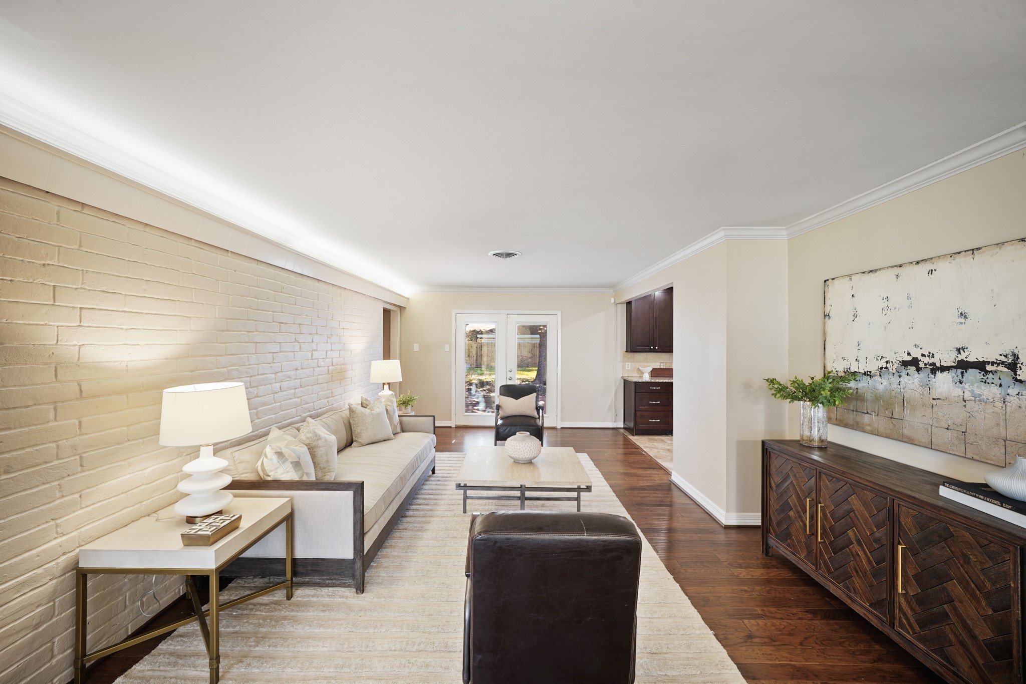 5671 Sylmar Road Houston, TX 77081 - Photo 12 of 50 a living room with furniture and a large window