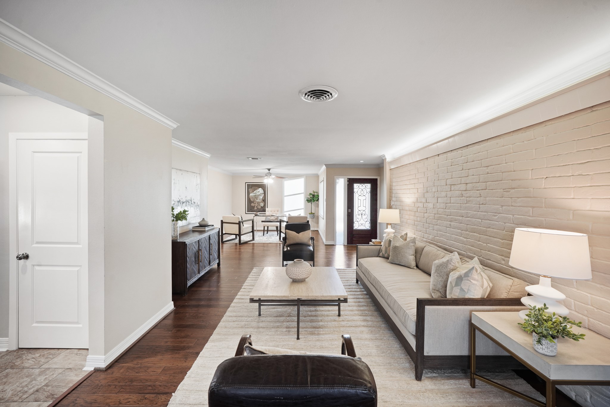 5671 Sylmar Road Houston, TX 77081 - Photo 46 of 50 a living room with furniture and a table