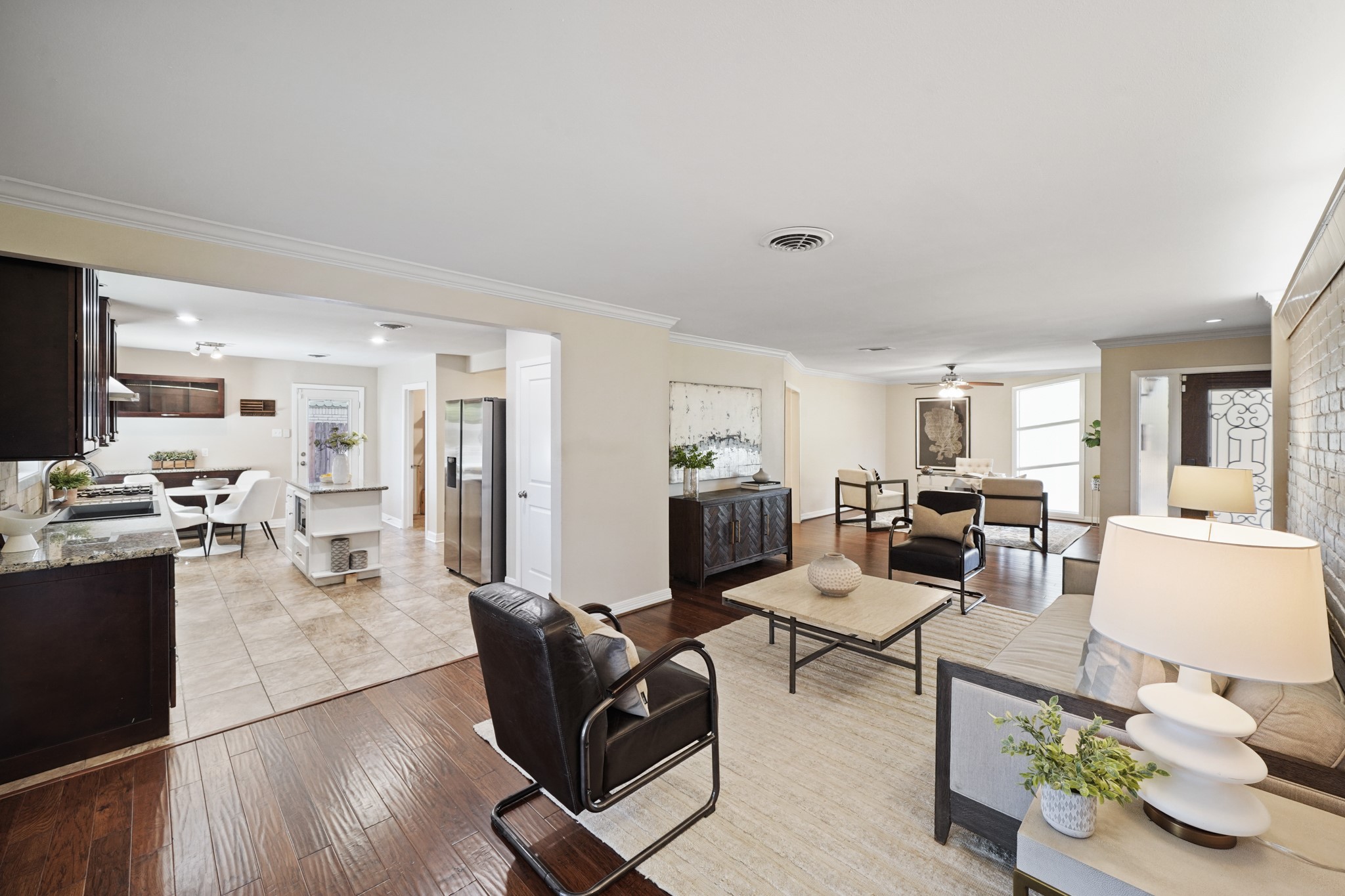 5671 Sylmar Road Houston, TX 77081 - Photo 48 of 50 a living room with furniture and a wooden floor
