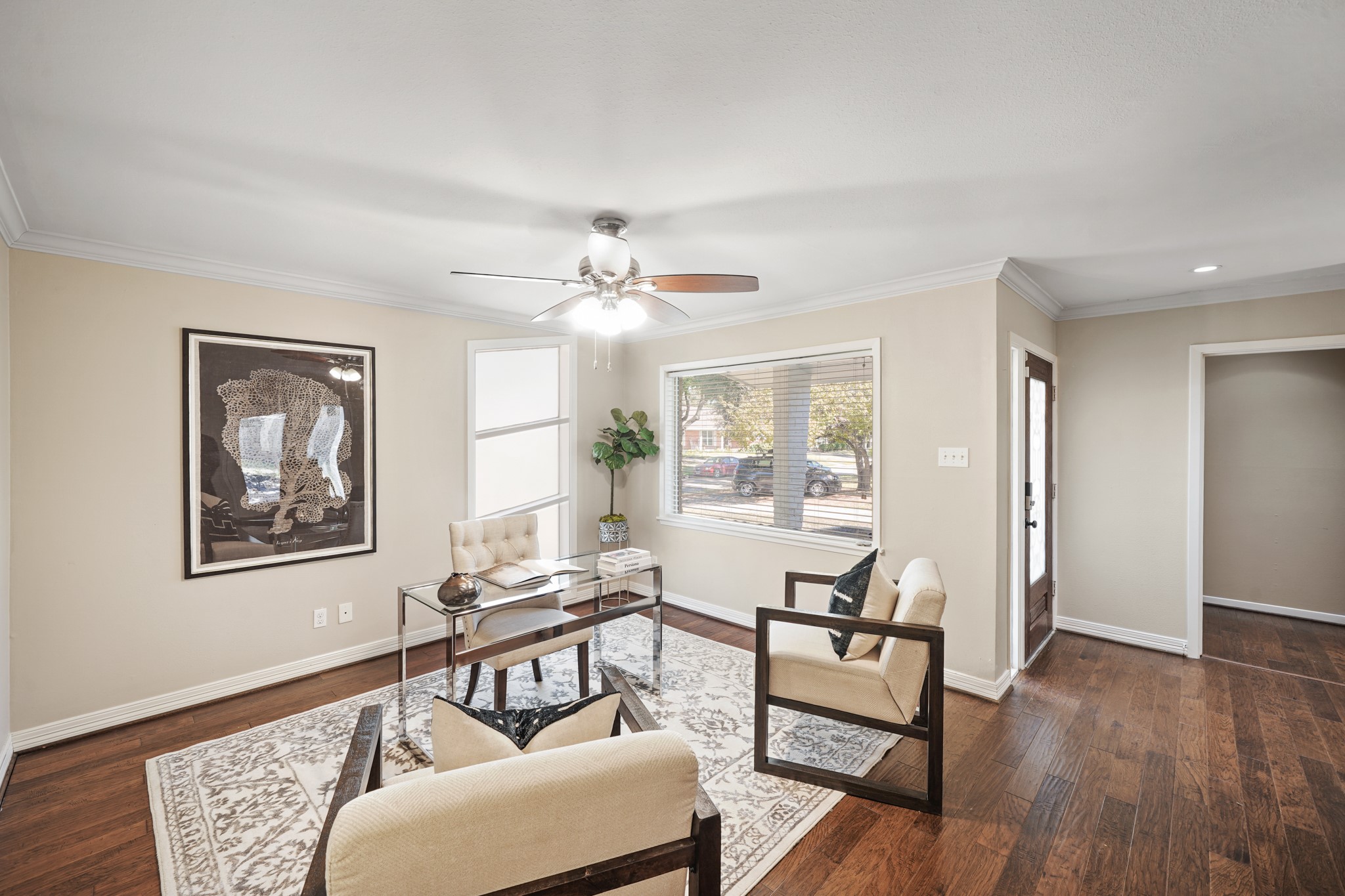 5671 Sylmar Road Houston, TX 77081 - Photo 9 of 50 a living room with furniture and a wooden floor