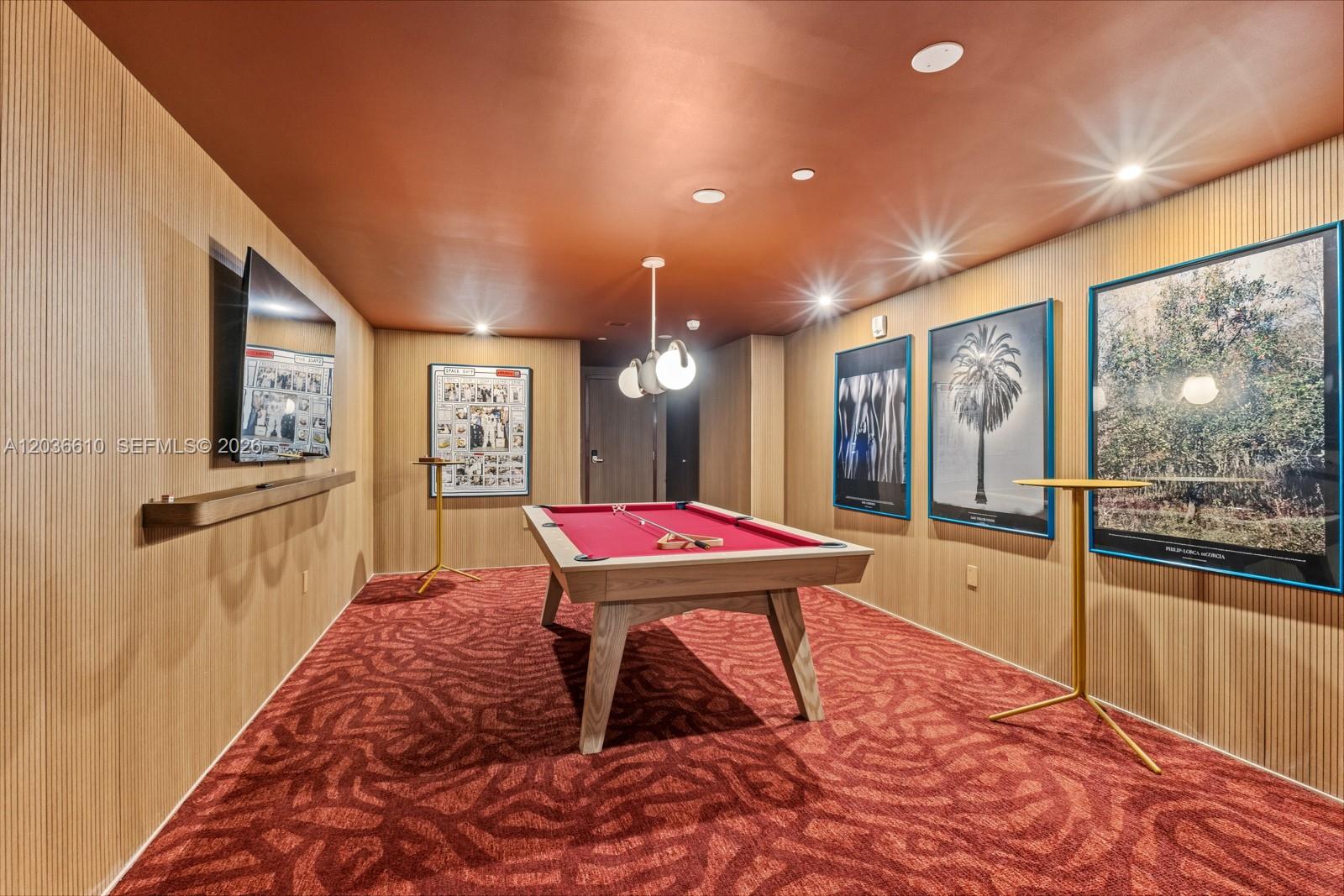 90 Northeast 32nd Street, Unit 1014 Miami, FL 33127 - Photo 24 of 39 a room with pool table and glass windows
