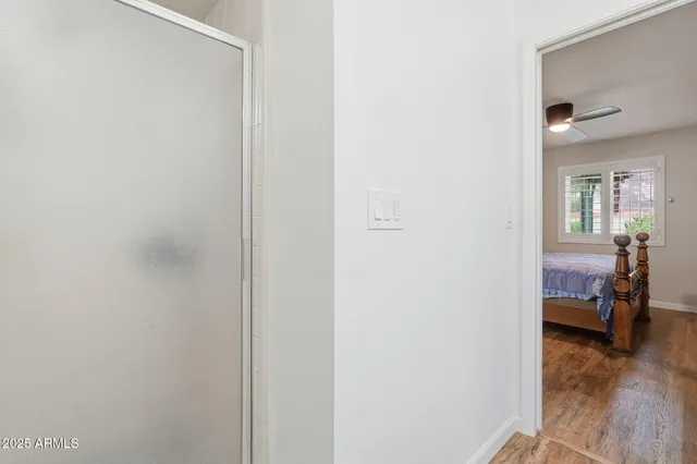 a view of a bedroom from a hallway