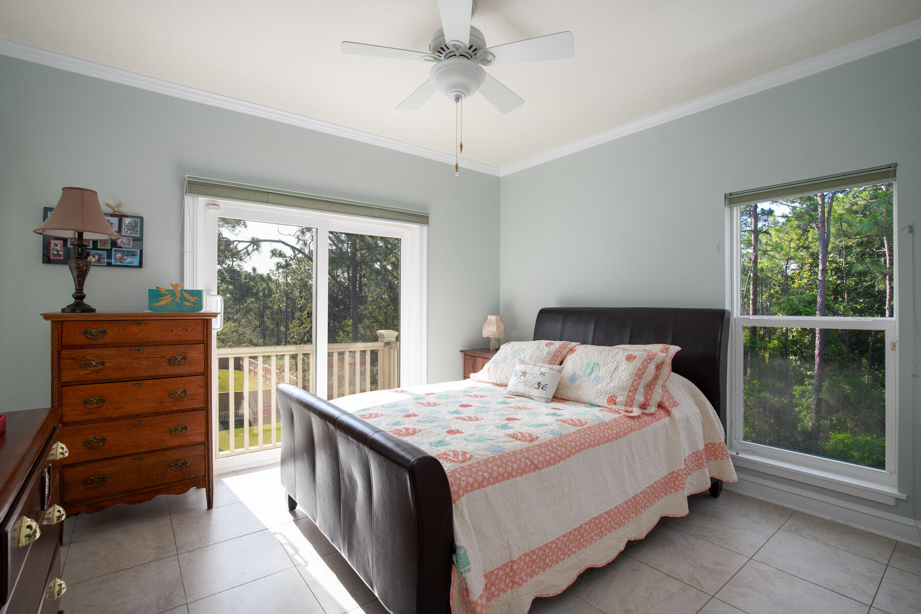 95 Blue Bell Circle Santa Rosa Beach, FL 32459 - Photo 17 of 29 a bedroom with a bed and a dresser