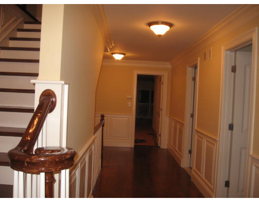40 Rochester Road Newton, MA 02458 - Photo 7 of 21 a view of a hallway with furniture and stairs