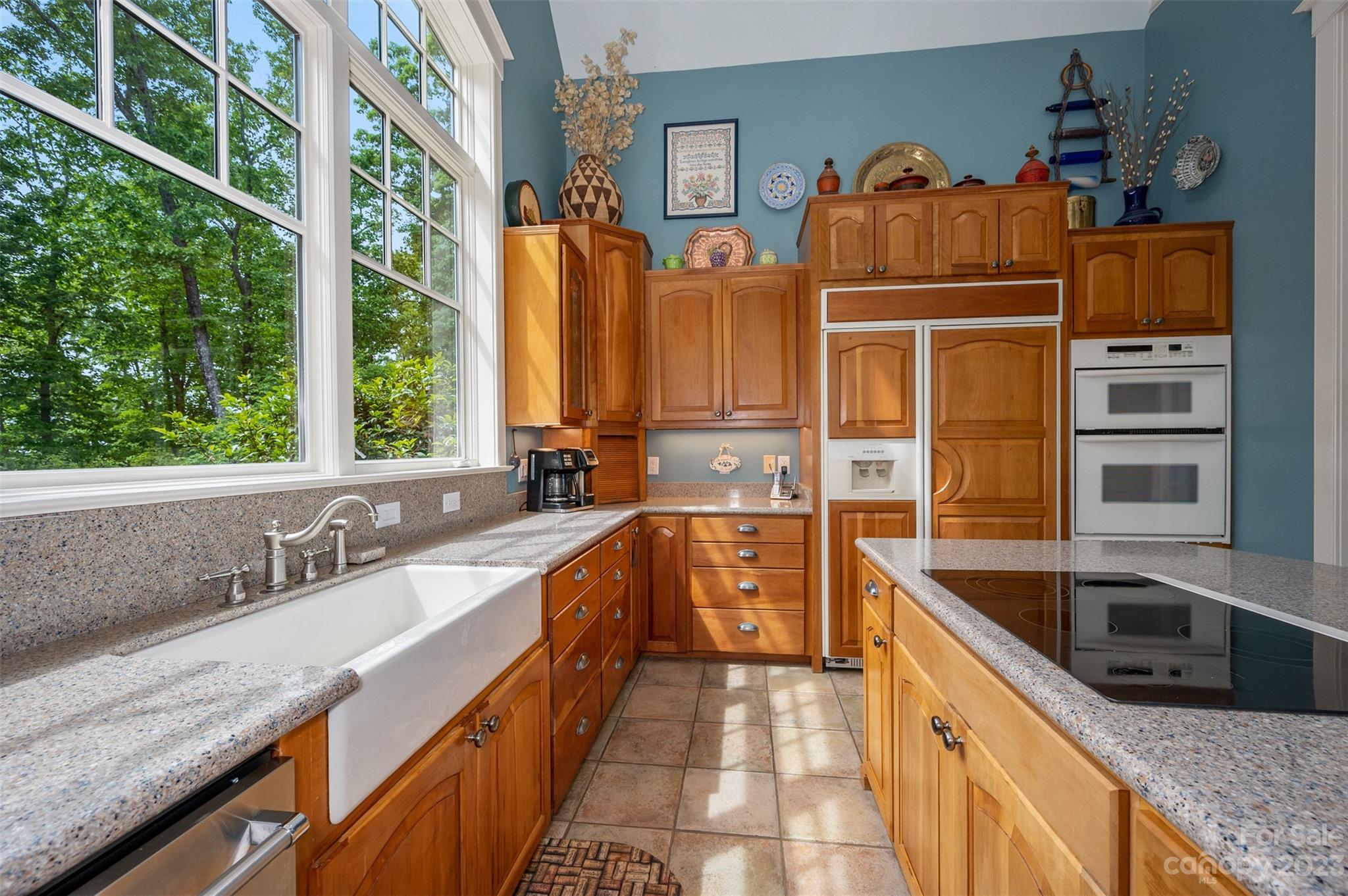 134 Broad River Run Rutherfordton, NC 28139 - Photo 21 of 48 a kitchen with stainless steel appliances granite countertop a sink and a stove
